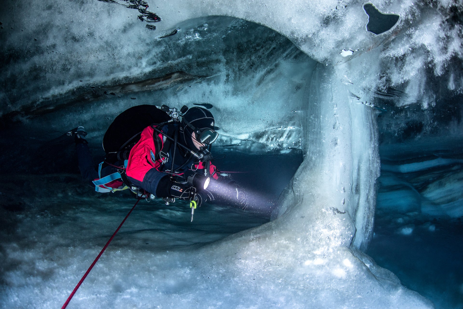 Diving Underneath Glaciers in Flooded Ice Caves